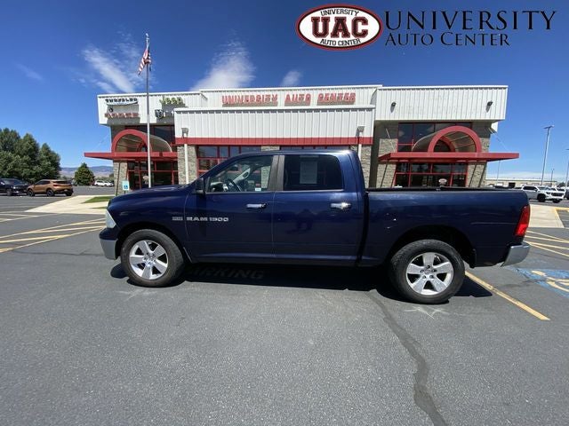 2012 RAM 1500 SLT in True Blue Pearlcoat — front three-quarter view