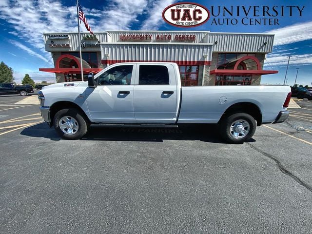 2026 RAM Ram 3500 RAM 3500 TRADESMAN CREW CAB 4X4 8' BOX in Bright White Clear-Coat Exterior Paint — front three-quarter view