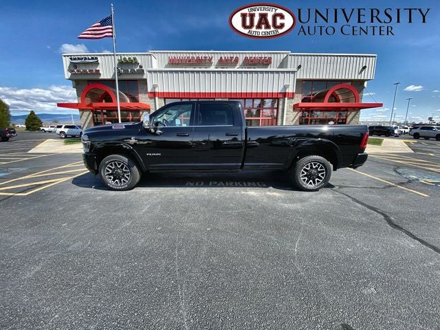 2026 RAM Ram 3500 RAM 3500 LIMITED LONGHORN CREW CAB 4X4 8' BOX in Diamond Black Crystal Pearl-Coat Exterior Paint — front three-quarter...
