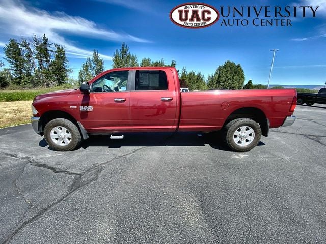 2014 RAM 2500 Big Horn in Deep Cherry Red Crystal Pearlcoat — front three-quarter view