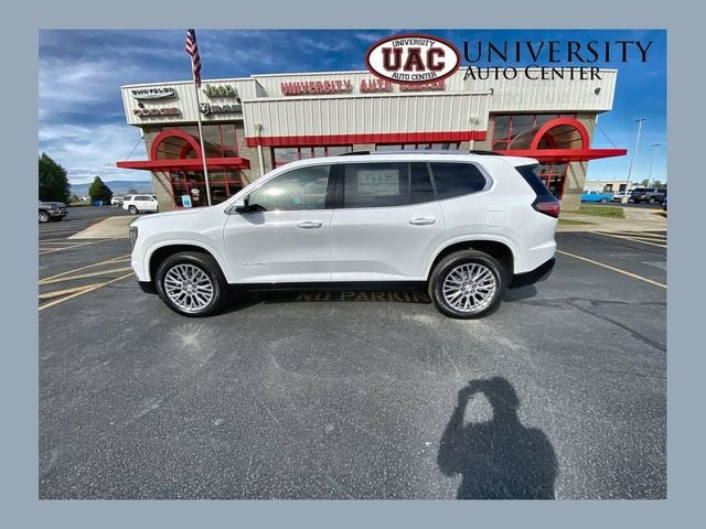 2026 GMC Acadia Denali in Summit White — front three-quarter view
